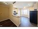 Bright kitchen with white cabinetry, stainless steel appliances, breakfast nook and tile floors at 650 Ganyard Farm Way # 41, Durham, NC 27703