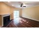 Bright living room with a fireplace and access to outdoor area through sliding glass doors at 650 Ganyard Farm Way # 41, Durham, NC 27703