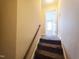 Carpeted stairway leading to the upper level at 650 Ganyard Farm Way # 41, Durham, NC 27703