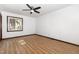 An empty bedroom featuring laminate flooring and a ceiling fan at 6516 Hearthstone Dr # 6516, Raleigh, NC 27615