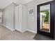 Entryway with large storage cabinet and glass paneled back door at 707 Lakewood Dr, Siler City, NC 27344