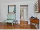 Entryway with hardwood floors, bench, and a decorative mirror at 707 Lakewood Dr, Siler City, NC 27344