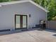 Back of house features a patio area and a grill on a concrete pad for outdoor entertainment at 707 Lakewood Dr, Siler City, NC 27344
