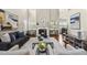 Spacious living room with fireplace, soaring ceilings and an open floor plan at 817 Ember Dr, Durham, NC 27703