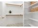 Walk-in closet with shelves and baskets at 8512 Erinsbrook Dr, Raleigh, NC 27617