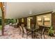 Back patio with outdoor seating and dining offers a perfect entertaining area at 8608 Valley Brook Dr, Raleigh, NC 27613