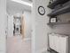 Spacious closet featuring modern gray shelves, storage and adjoining rooms at 8608 Valley Brook Dr, Raleigh, NC 27613