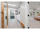 Well-organized walk-in closet leading to main bedroom and bathroom at 8608 Valley Brook Dr, Raleigh, NC 27613