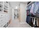 Walk-in closet with custom shelving and organizational spaces at 8608 Valley Brook Dr, Raleigh, NC 27613