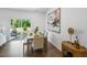 Bright dining room adjacent to patio offers ample space for entertaining at 8732 Wardle Ct, Wake Forest, NC 27587