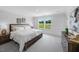 Comfortable main bedroom with large windows and neutral decor at 8732 Wardle Ct, Wake Forest, NC 27587