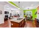 Open-concept kitchen and living area with granite countertops and modern appliances at 100 Lexington Ave, Zebulon, NC 27597