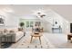 Spacious living area with modern furnishings, a cozy sofa, and a decorative rug at 100 Lexington Ave, Zebulon, NC 27597