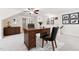 This bright home office offers a functional workspace with its stylish desk and storage furniture at 100 Lexington Ave, Zebulon, NC 27597