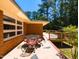 Outdoor patio area with a table and chairs, perfect for entertaining at 106 N Lakeside Dr, Smithfield, NC 27577