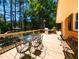 Large wooden deck with a stainless steel grill and comfortable seating area at 106 N Lakeside Dr, Smithfield, NC 27577