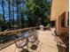 Spacious wooden deck perfect for entertaining, featuring a dining area, grilling station, and lake views at 106 N Lakeside Dr, Smithfield, NC 27577