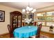 Dining room with traditional wood furniture, china cabinet, and bright window at 106 N Lakeside Dr, Smithfield, NC 27577