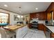 Kitchen featuring island with seating, stainless steel appliances and cabinetry at 106 N Lakeside Dr, Smithfield, NC 27577