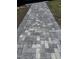Attractive patterned walkway with gray and white brick pavers leading to the home at 106 N Lakeside Dr, Smithfield, NC 27577