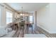 Open-concept dining area flowing seamlessly into the kitchen and living space at 1071 Turlington Rd, Dunn, NC 28334