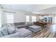 Spacious living room with a large, comfortable sectional sofa open to the kitchen at 1071 Turlington Rd, Dunn, NC 28334