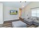 Comfortable living area with TV and gray sectional, perfect for relaxing at 1071 Turlington Rd, Dunn, NC 28334