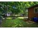 An expansive backyard area with picnic tables and mature trees at 112 Noble St, Chapel Hill, NC 27516