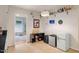 Kitchenette with mini fridges, shelving, and easy access to the living room at 112 Noble St, Chapel Hill, NC 27516