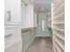 Walk-in closet with custom storage, shelving, and racks for organization at 113 Paladin Place, Cary, NC 27513