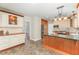 Spacious kitchen with custom cabinetry, stainless steel appliances, and a center island at 113 Paladin Place, Cary, NC 27513
