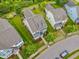 An aerial shot shows a residential area with well-spaced houses, green lawns, and tree-lined streets at 1144 Survada Ln, Morrisville, NC 27560