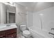 Well-lit bathroom featuring a vanity, toilet, and tub with shower at 1144 Survada Ln, Morrisville, NC 27560