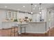 Bright kitchen with granite countertops, breakfast bar and stainless steel appliances at 1144 Survada Ln, Morrisville, NC 27560