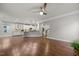 Open-concept living space with hardwood floors and a seamless transition to the gourmet kitchen at 1144 Survada Ln, Morrisville, NC 27560