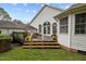 Spacious deck features outdoor seating, perfect for relaxing and entertaining at 1146 Rogers Rd, Graham, NC 27253