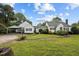 Charming one-story home with a well-manicured lawn, complemented by a convenient carport at 1146 Rogers Rd, Graham, NC 27253