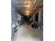 Unfinished basement with exposed ceiling, cement flooring, columns, and ladder, providing ample storage space at 121 Flint Point Ln, Holly Springs, NC 27540