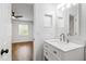 Stylish bathroom features a modern vanity and view into bedroom at 129 Assembly Ct, Cary, NC 27511