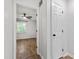 Bright bedroom view with hardwood flooring, ceiling fan and window at 129 Assembly Ct, Cary, NC 27511