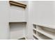 Well-organized closet with built-in shelving and hanging rods for optimal storage at 129 Assembly Ct, Cary, NC 27511
