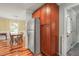 This spacious kitchen features wood floors and stainless steel refrigerator at 1413 Roy Averette Dr, Raleigh, NC 27603
