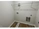 Functional laundry room features washer/dryer hookups and storage shelf above at 148 Coharie Dr, Lillington, NC 27546