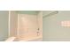 Bathtub and shower combination with white tile surround at 151 Braeside Ct, Cary, NC 27519