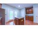 Featuring stainless steel appliances, granite countertops, an island, and access to the outdoor space at 151 Braeside Ct, Cary, NC 27519