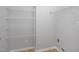 Walk-in closet with wire shelving and laminate flooring offers practical storage at 1510 Bungalow Ave, Durham, NC 27703