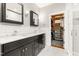 Bright bathroom features a double vanity and a view into the walk-in closet at 1535 Caraleigh Mills Ct # 111, Raleigh, NC 27603