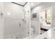 Bathroom features a walk-in shower with beautiful white subway tile and pebble tile floor at 1535 Caraleigh Mills Ct # 111, Raleigh, NC 27603