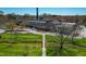 Picturesque exterior view highlighting the lush green space and renovated historic building at 1535 Caraleigh Mills Ct # 111, Raleigh, NC 27603