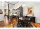 Open-concept kitchen with gray cabinets, stainless steel appliances, and a dining area at 1535 Caraleigh Mills Ct # 111, Raleigh, NC 27603